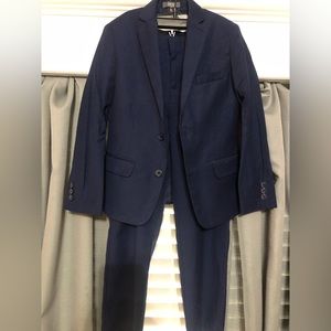 Van Heusen suit.